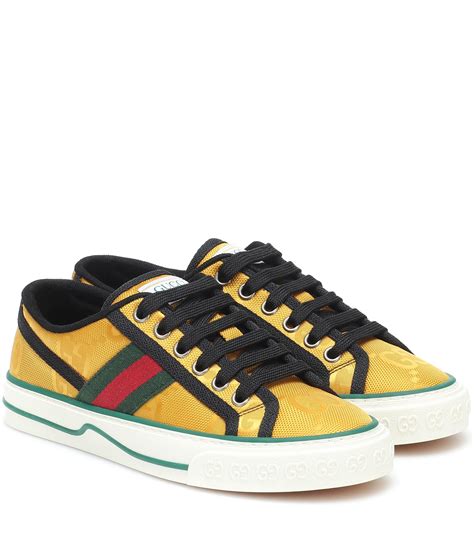 yellow Gucci sneakers